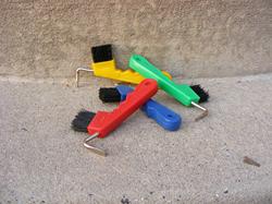 Plastic handle hoofpick with brush