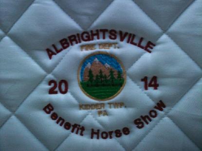 Custom embroidered design on headrest cover